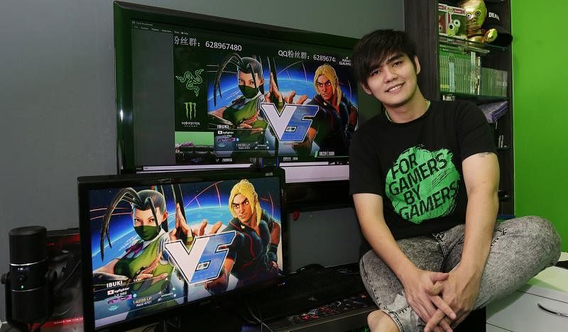 全职玩家何坤贤，是第一名登上《街头霸王4》世界冠军宝座的新加坡人。（档案照）
