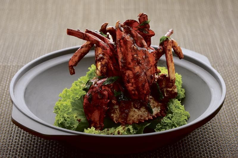 黑松露胡椒螃蟹是冯洱迅的创新菜。