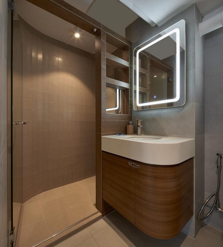 卫浴间的盥洗台也采用弧形设计。