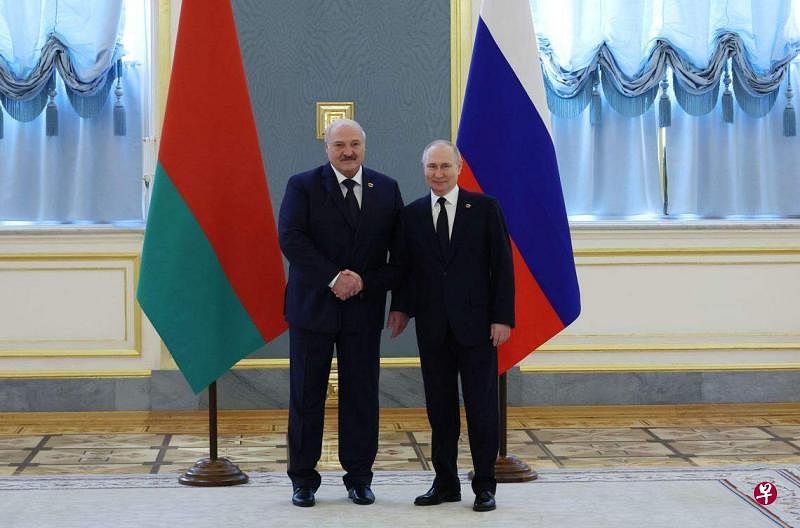 白罗斯总统卢卡申科（左）是俄罗斯总统普京的坚定盟友。（法新社）