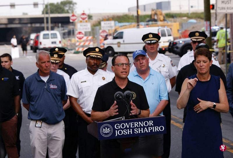 宾州州长夏皮罗（中）在11日的新闻发布会上说，他将在12日签署灾难声明，释放联邦资金和其他援助措施。（法新社）