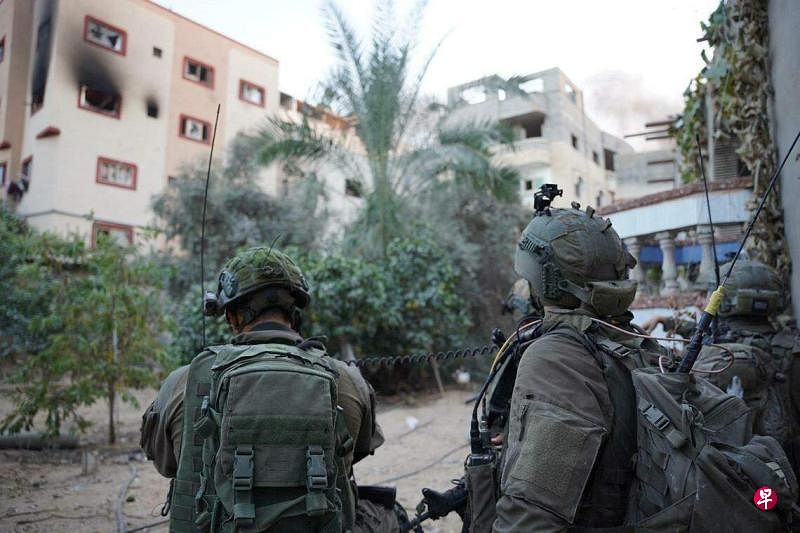 以色列国防军星期二（11月14日）说，他们已控制哈马斯在加沙城谢赫伊伊林和利马勒居民区的几座政用大楼，包括哈马斯宪兵总部、政府大楼和警察局。图为以色列国防军当天发布的视频截图。（路透社）