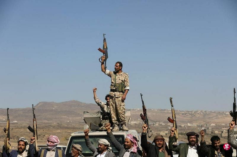 1月14日，胡塞武装和支持者在也门举行集会。（路透社）